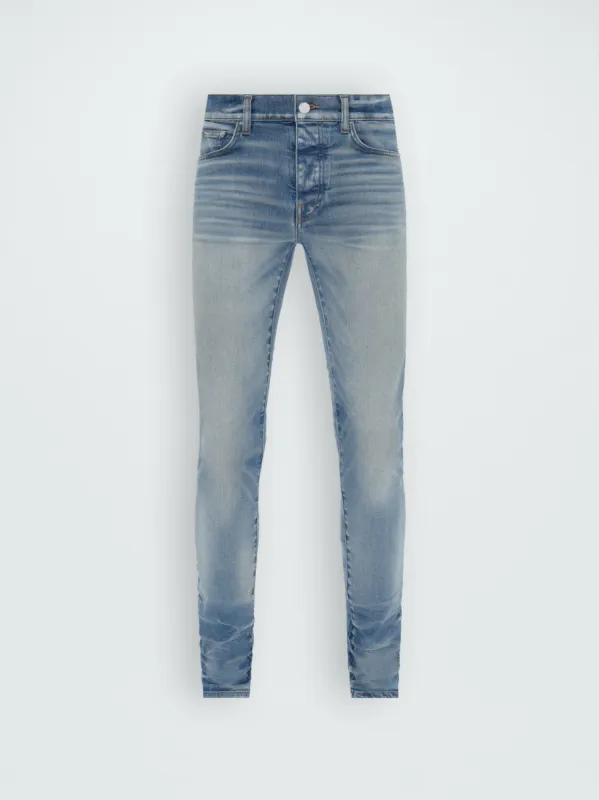 STACK JEAN - HONEYCOMB INDIGO sold by AMIRI