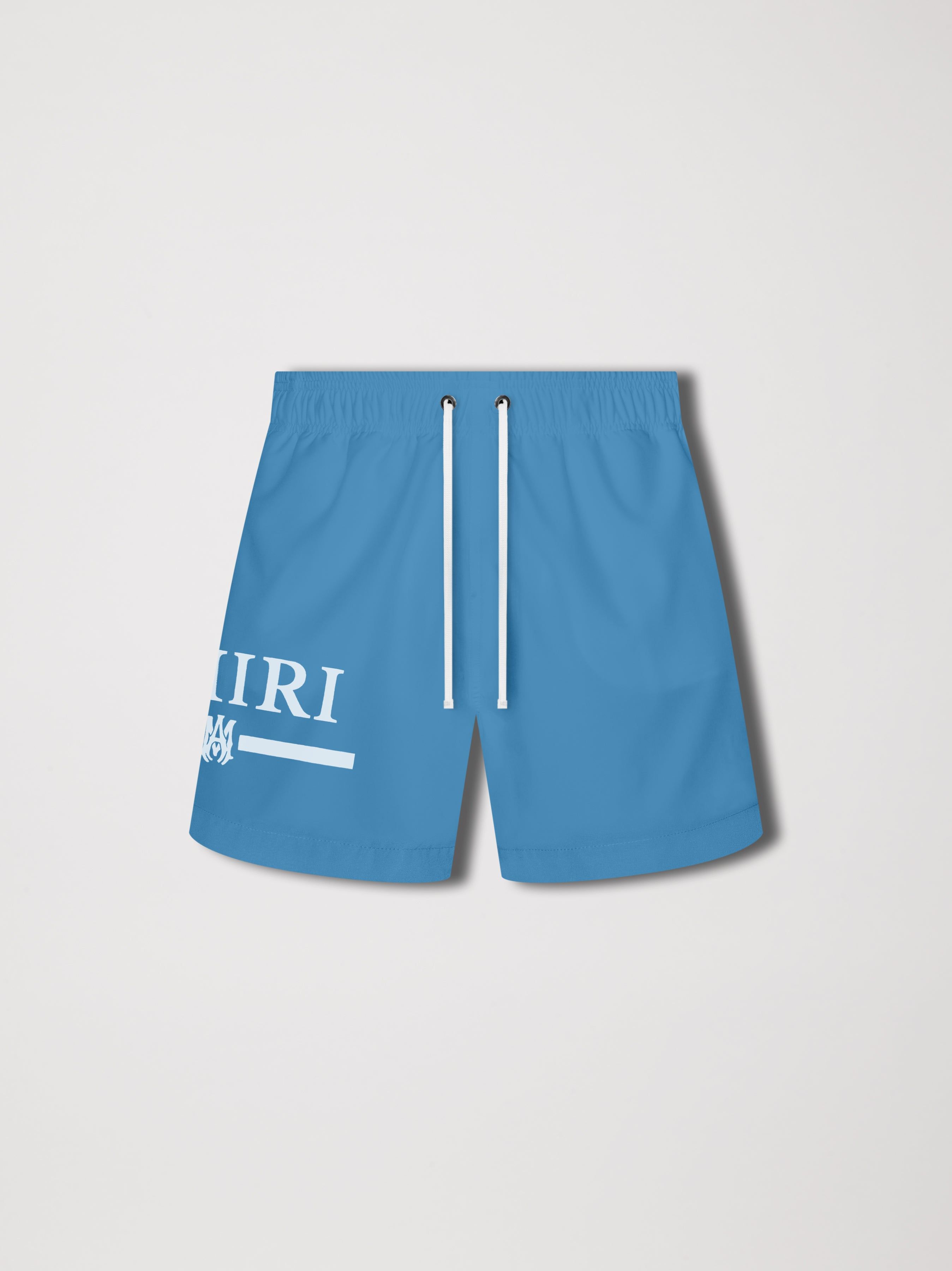 AMIRI M.A. BAR LOGO SWIM TRUNKS - CAROLINA BLUE sold by AMIRI