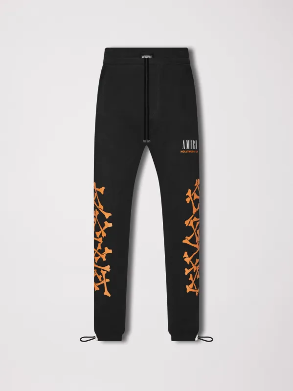 AMIRI BONES SWEATPANTS - BLACK ORANGE sold by AMIRI