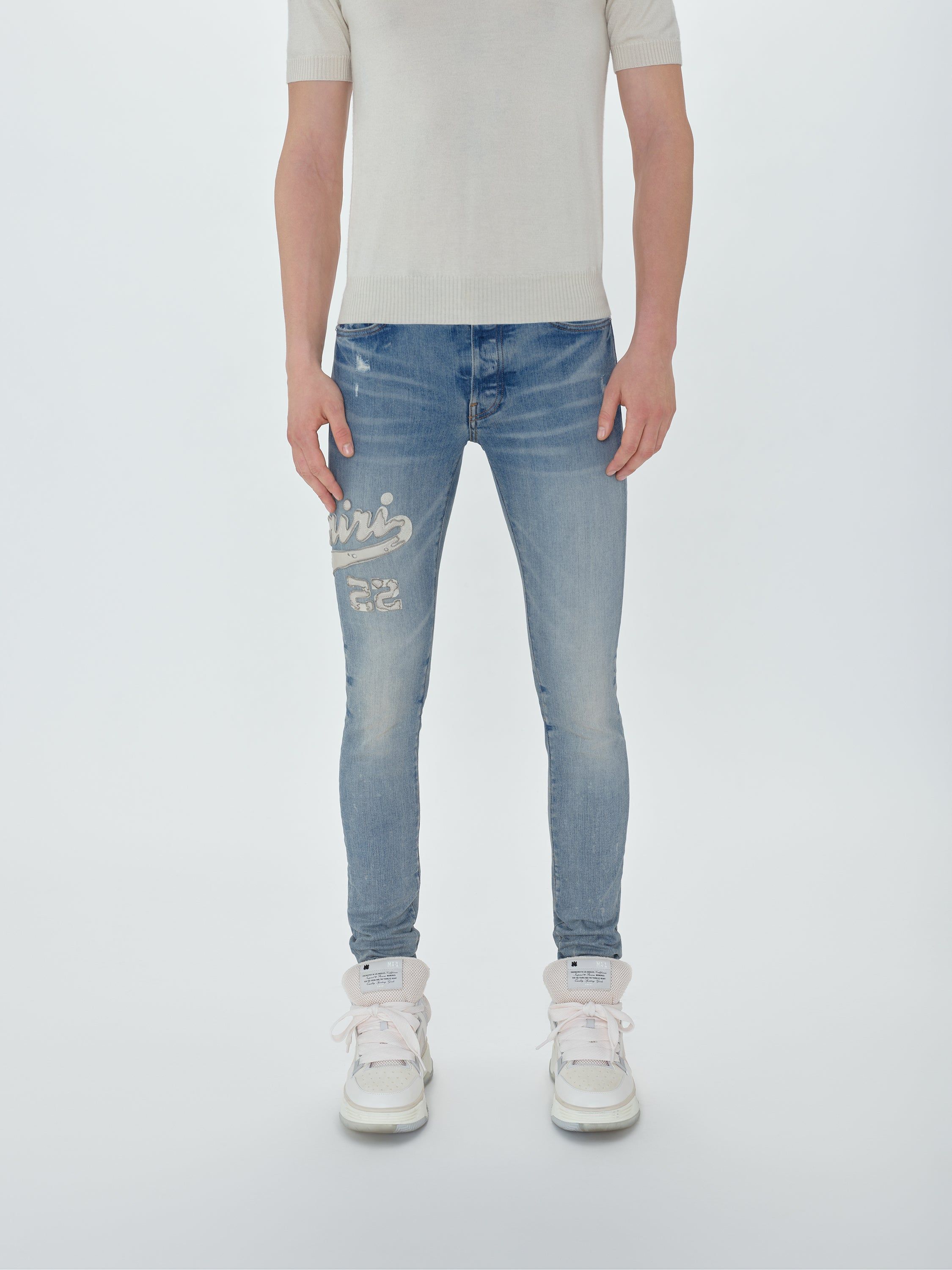 VARSITY APPLIQUE LOGO JEAN - CLAY INDIGO sold by AMIRI product image thumbnail 2