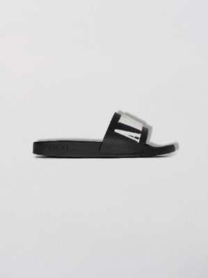 WOMEN - LOGO POOL SLIDE - BLACK / WHITE sold by AMIRI