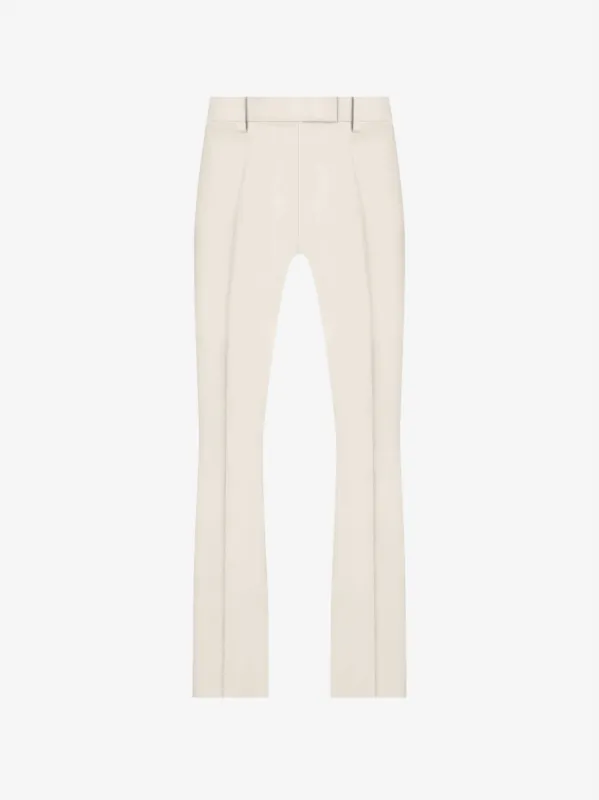 TAILORED FLARE PANTS - Alabaster sold by AMIRI