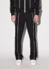 WESTERN TRACK PANTS - BLACK sold by AMIRI