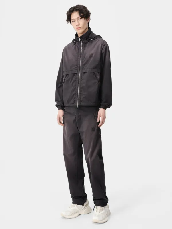 SUN FADED MA TRACK PANT - Black sold by AMIRI
