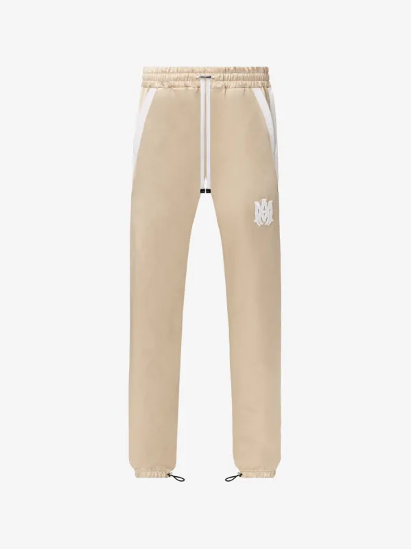 DRAWSTRING TRACKPANT - CHAMPAGNE / WHITE sold by AMIRI