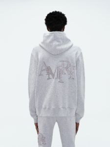 AMIRI STAGGERED HOODIE - HEATHER GREY sold by AMIRI