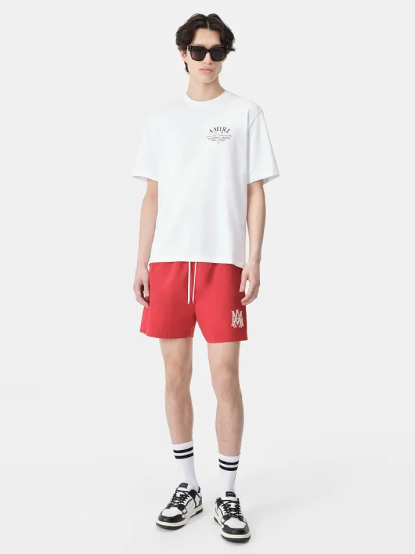 MA CORE LOGO SWIM TRUNK - Red sold by AMIRI