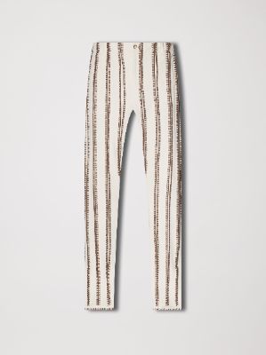 STITCH TRACK FLARE PANT - ALABASTER sold by AMIRI