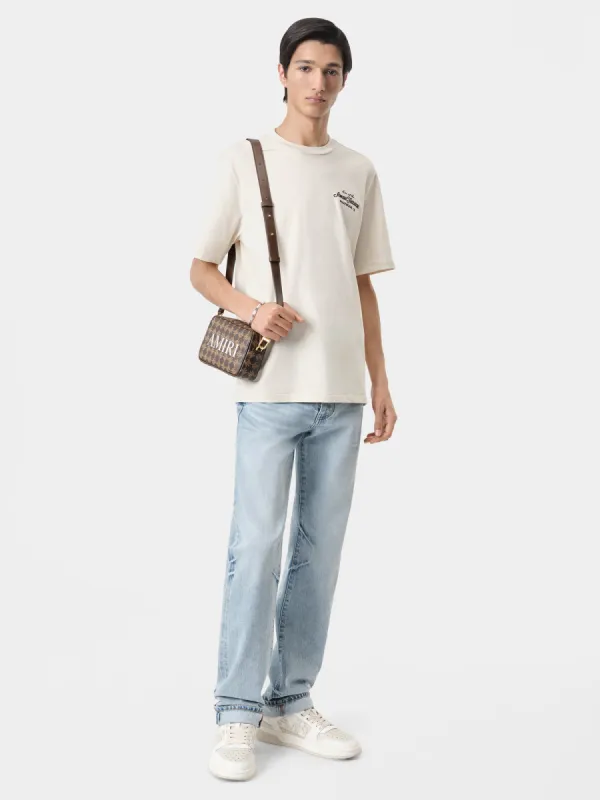 AMIRI THEATRE FLOCKED TEE - Alabaster sold by AMIRI