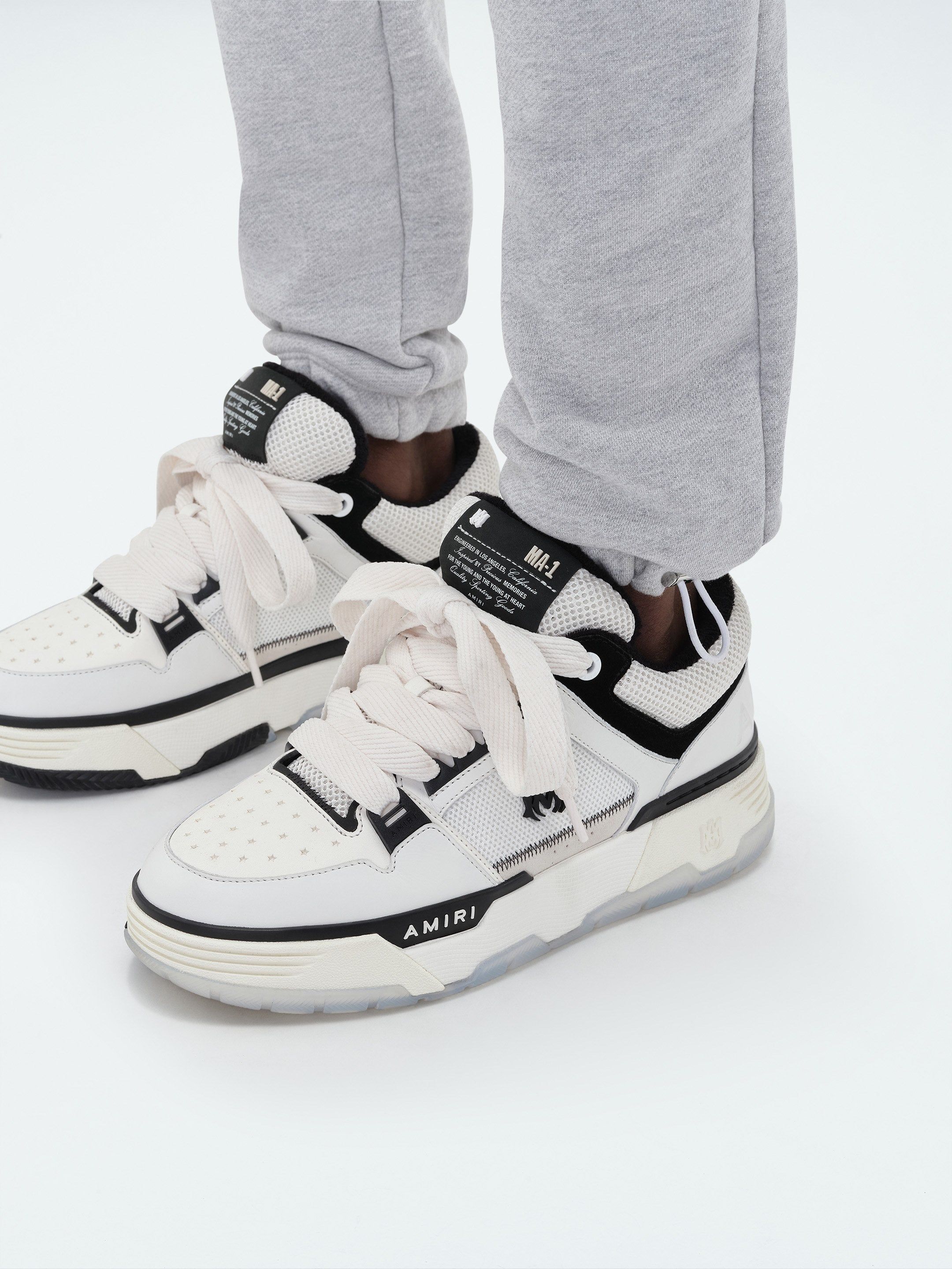 AMIRI STAGGERED SWEATPANT - HEATHER GREY sold by AMIRI product image thumbnail 8