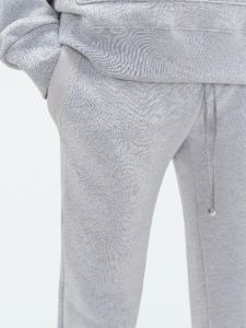 AMIRI STAGGERED SWEATPANT - HEATHER GREY sold by AMIRI