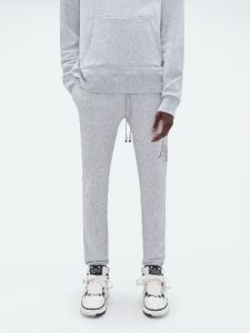 AMIRI STAGGERED SWEATPANT - HEATHER GREY sold by AMIRI