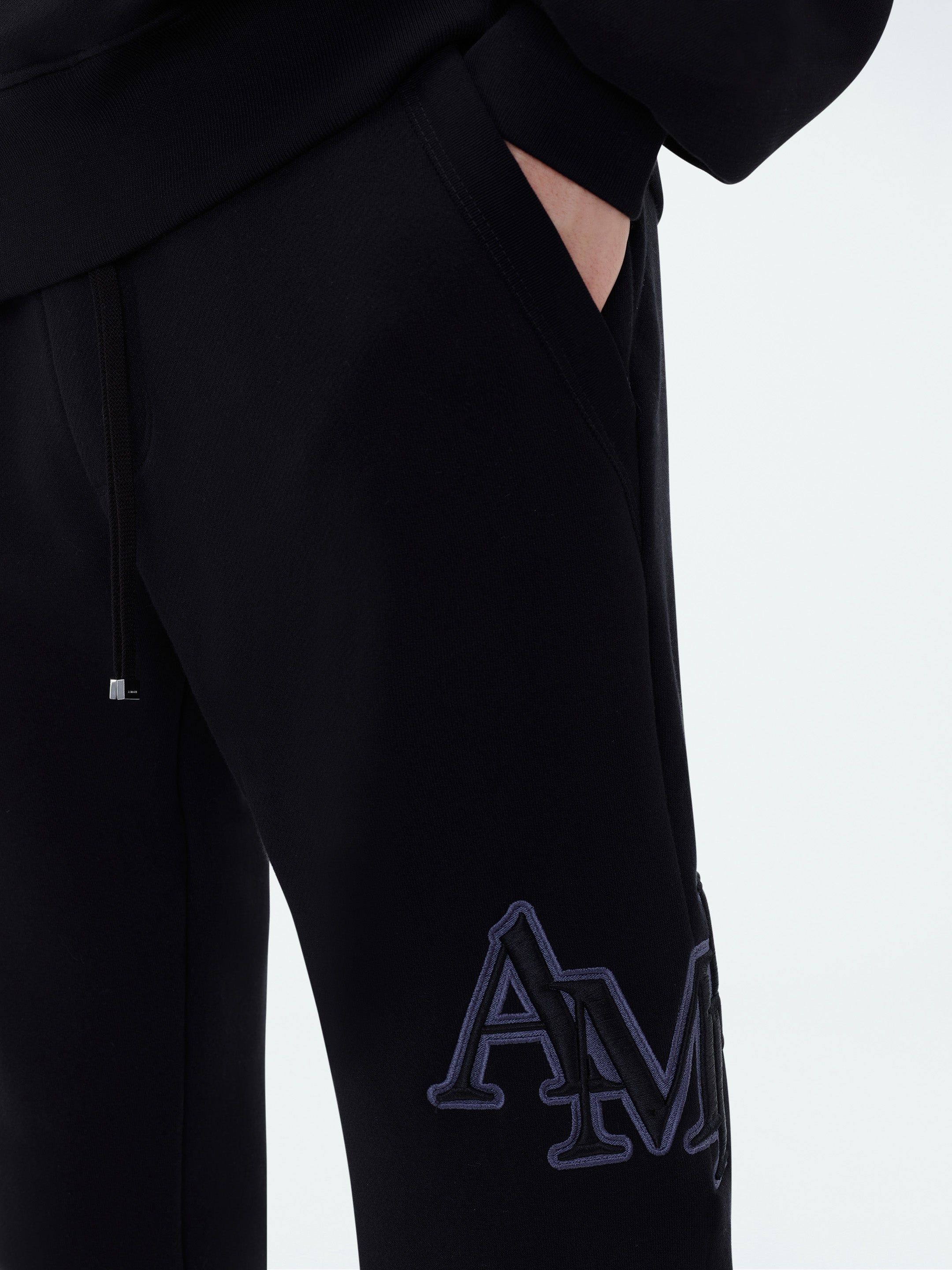 AMIRI STAGGERED SWEATPANT - BLACK sold by AMIRI product image thumbnail 6