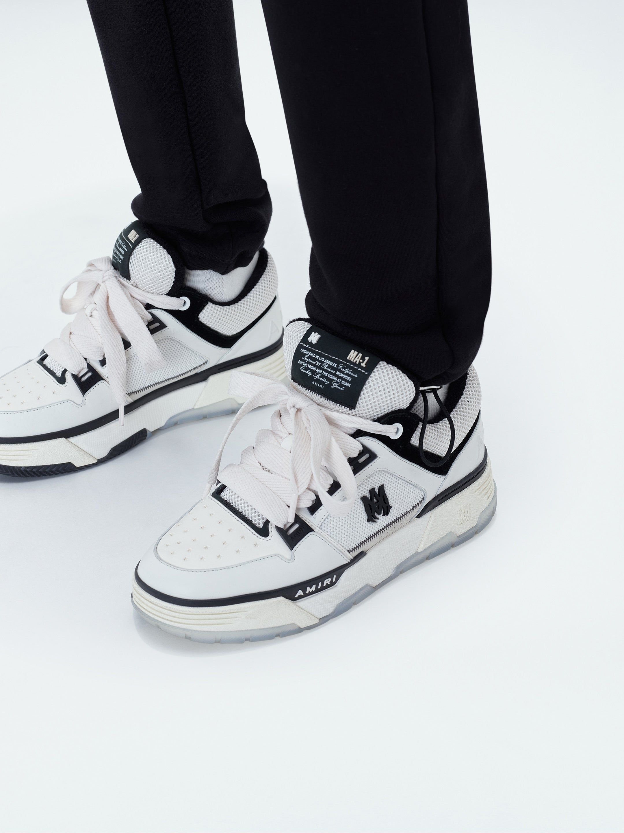 AMIRI STAGGERED SWEATPANT - BLACK sold by AMIRI product image thumbnail 7