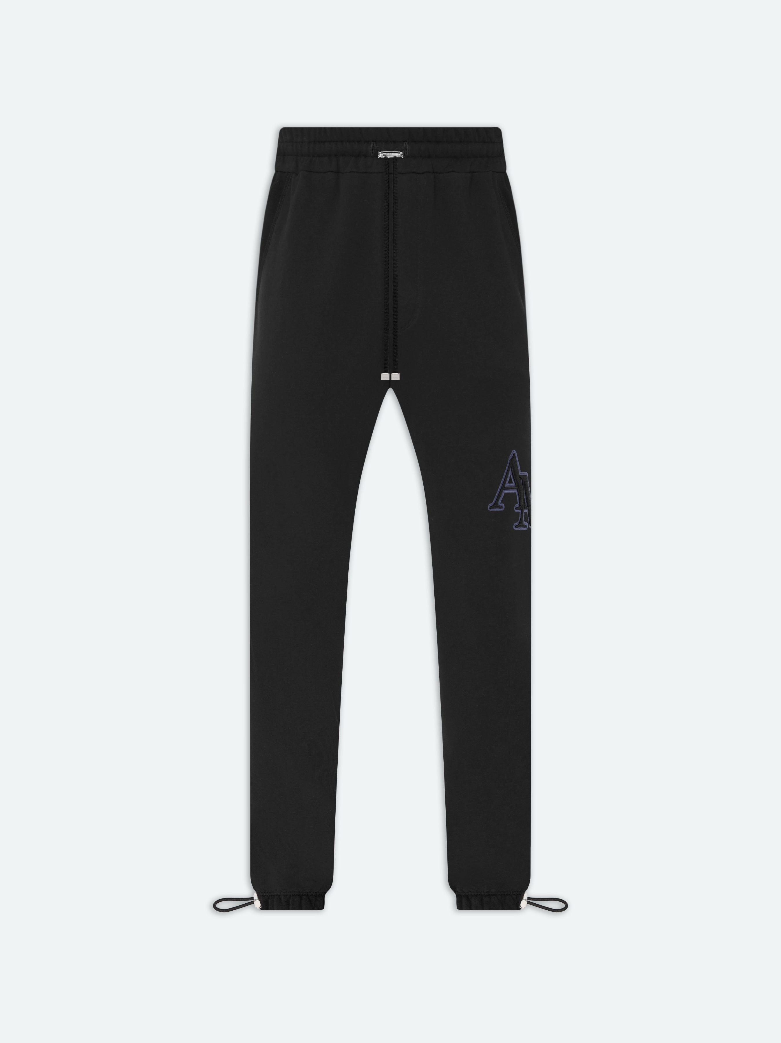 AMIRI STAGGERED SWEATPANT - BLACK sold by AMIRI