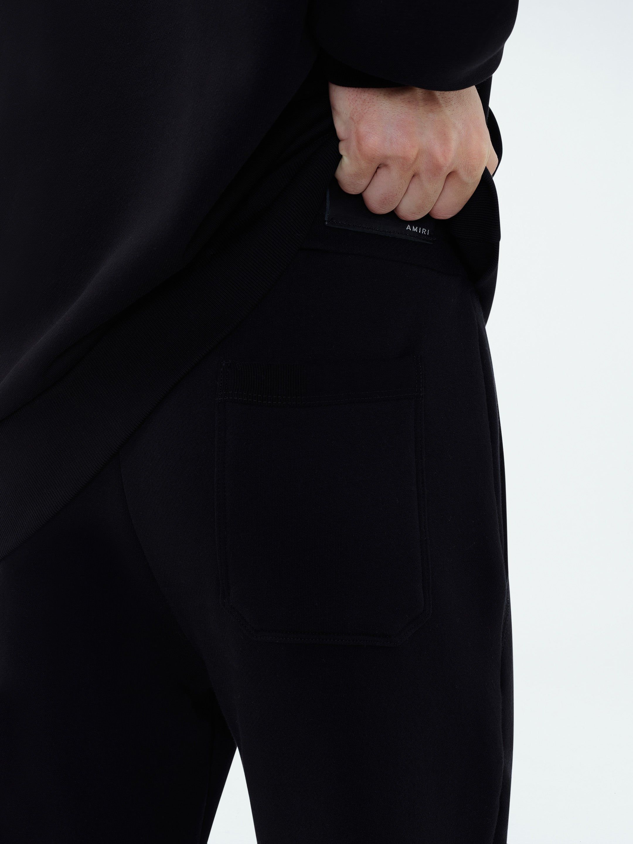 AMIRI STAGGERED SWEATPANT - BLACK sold by AMIRI product image thumbnail 8