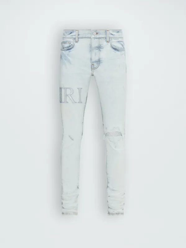 CRYSTAL EMBELLISHED LOGO JEAN - BLEACHED INDIGO sold by AMIRI