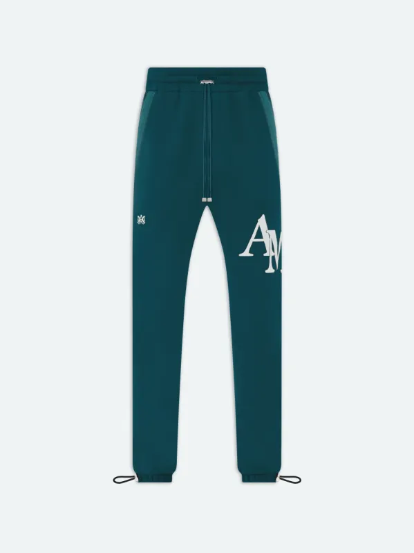 AMIRI STAGGERED SWEATPANT - Rain Forest sold by AMIRI