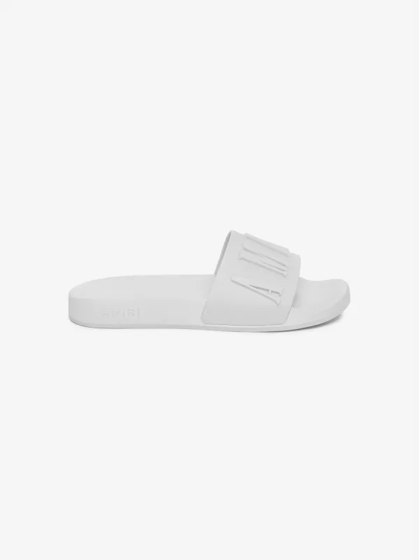 LOGO POOL SLIDE - WHITE made by AMIRI