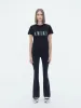 WOMEN - CORE LOGO SLIM FIT TEE - Black sold by AMIRI
