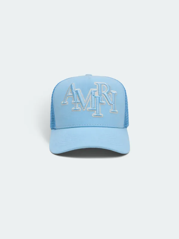 STAGGERED AMIRI LOGO TRUCKER - Air Blue sold by AMIRI