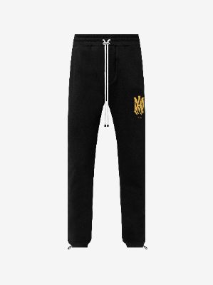 M.A. SWEATPANTS - BLACK / GOLD sold by AMIRI