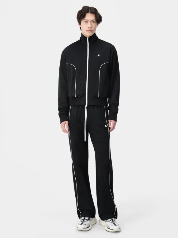 MA FLARE TRACK PANT - Black sold by AMIRI