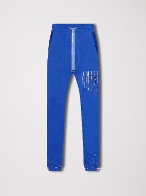 EMBROIDERED PAINT DRIP CORE LOGO SWEATPANTS - BLUE / WHITE sold by AMIRI