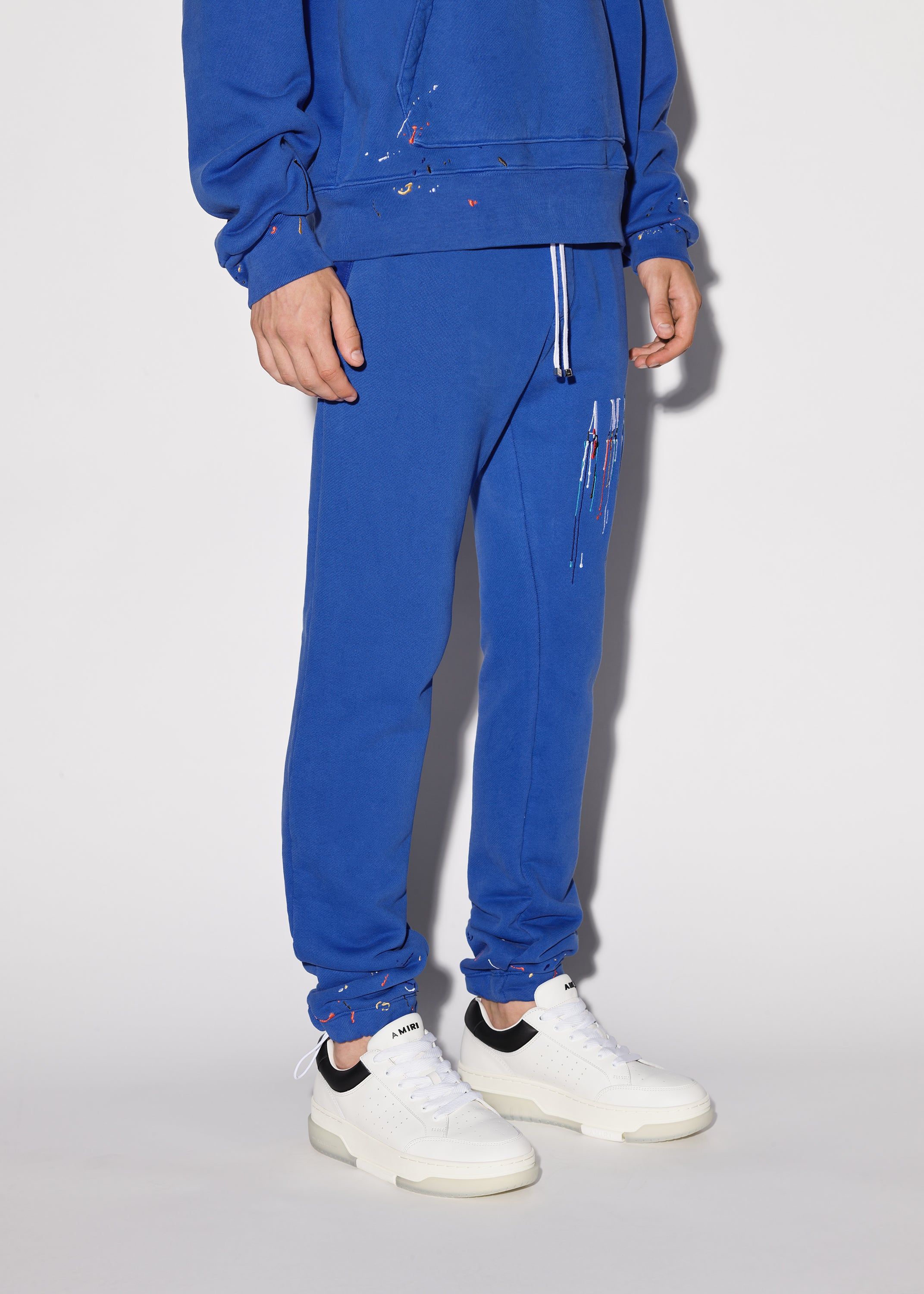 EMBROIDERED PAINT DRIP CORE LOGO SWEATPANTS - BLUE / WHITE sold by AMIRI product image thumbnail 3