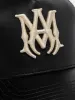 LEATHER MA TRUCKER HAT - Black sold by AMIRI