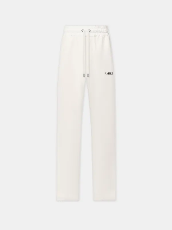 LOUNGE TRACK PANT - Alabaster sold by AMIRI