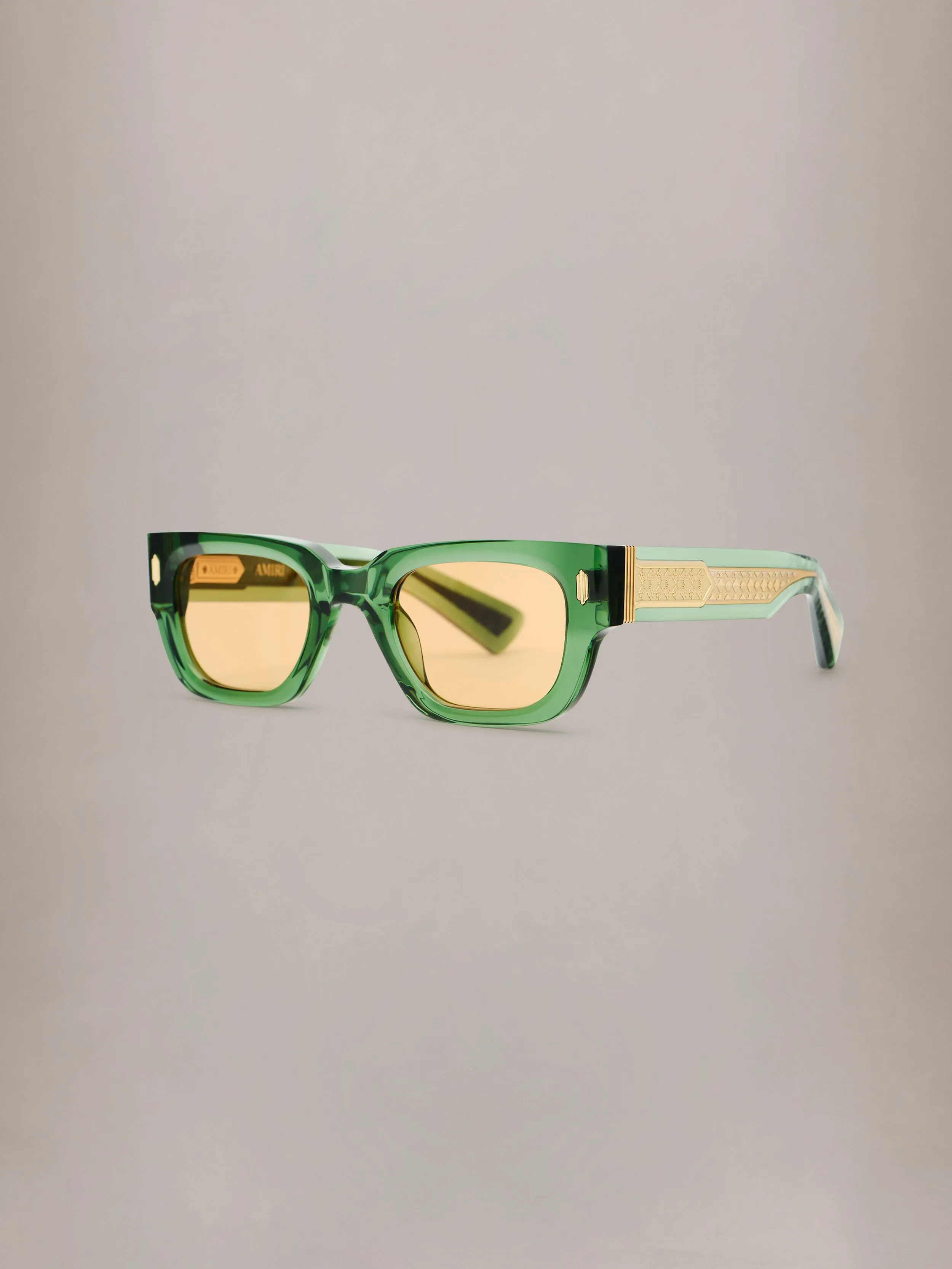 VENICE EXPOSED CORE WIRE - Transparent Green Brown Gold sold by AMIRI