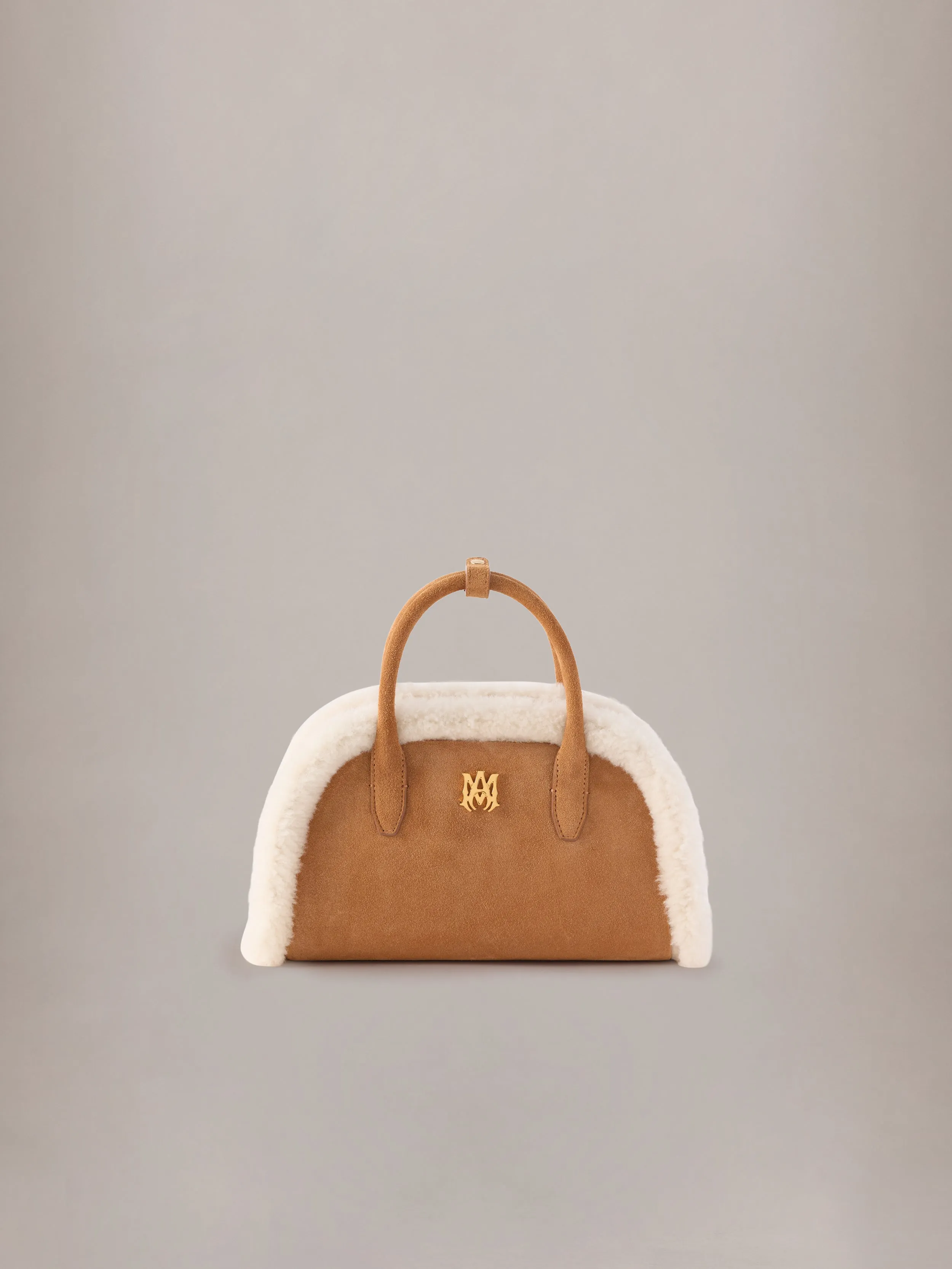 WOMEN - WOMEN'S SHEARLING MA BOWLING BAG - Sand sold by AMIRI