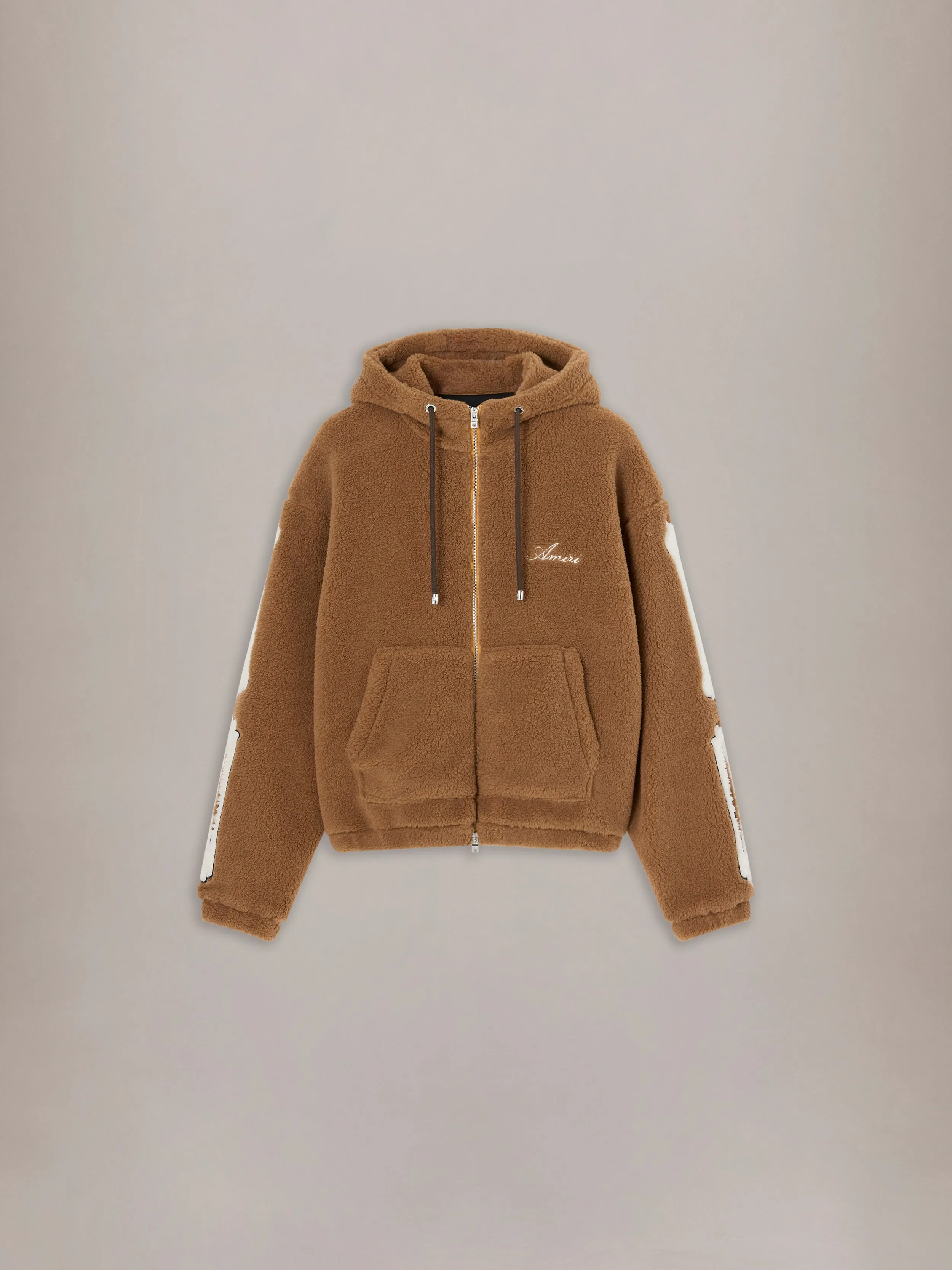 BONES FLEECE ZIP HOODIE - Golden Glow sold by AMIRI