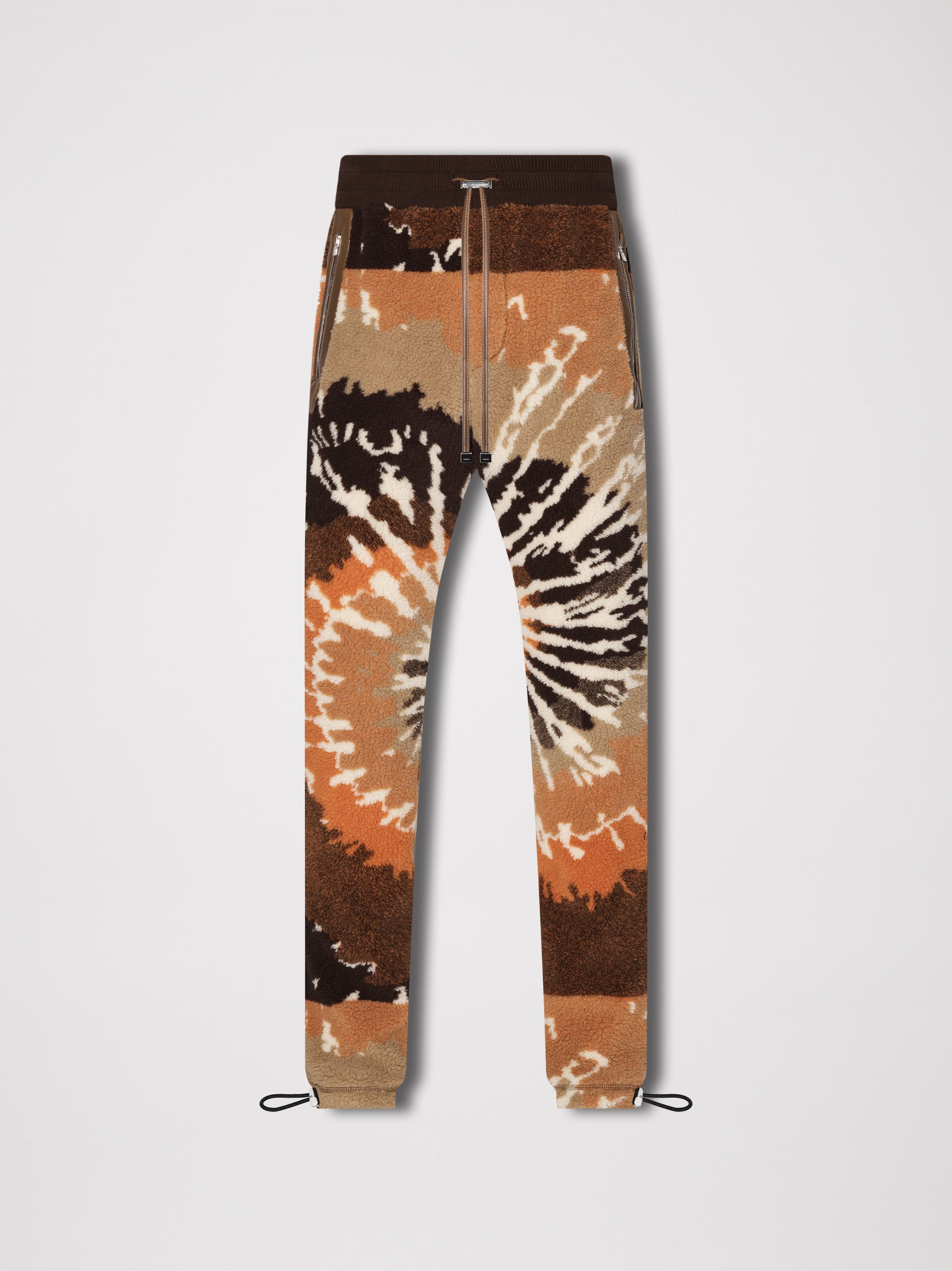 TIE DYE POLAR FLEECE PANTS - ORANGE / BLACK sold by AMIRI