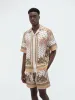 PALM TREE BOWLING SHIRT - Copper Brown sold by AMIRI