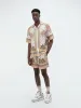 PALM TREE BOWLING SHIRT - Copper Brown sold by AMIRI