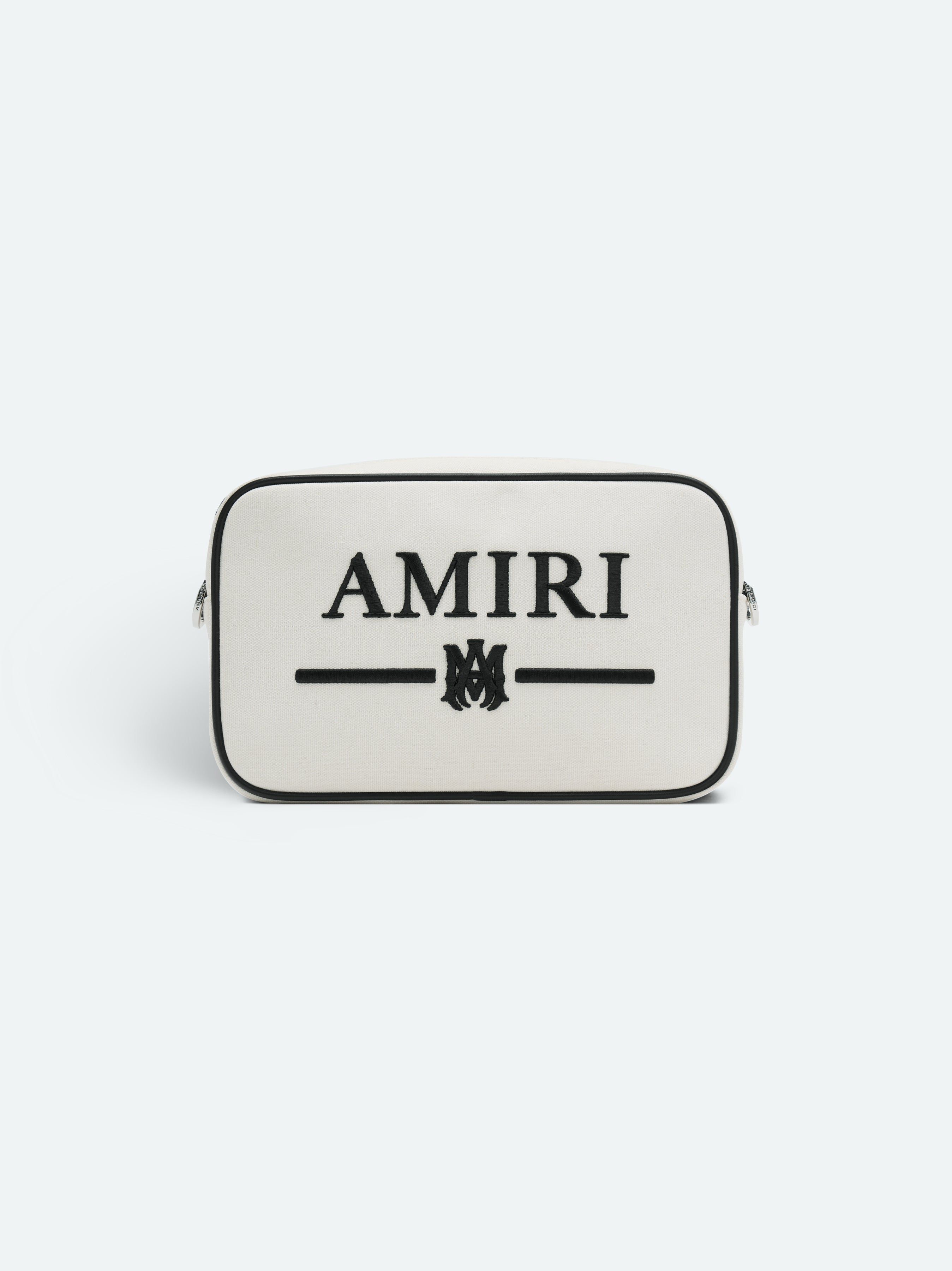 MA BAR CANVAS CAMERA CASE - Alabaster sold by AMIRI