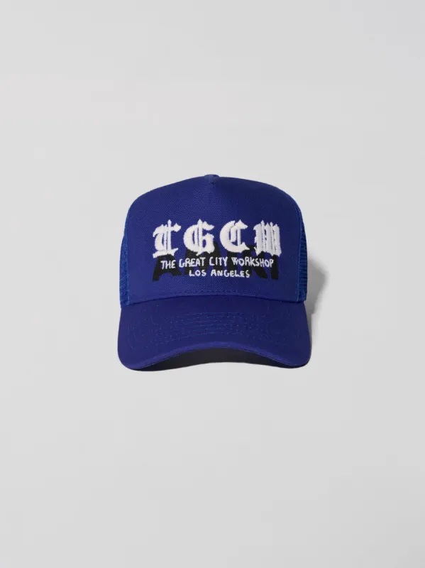 T.G.C.W. TRUCKER HAT - BLUE made by AMIRI
