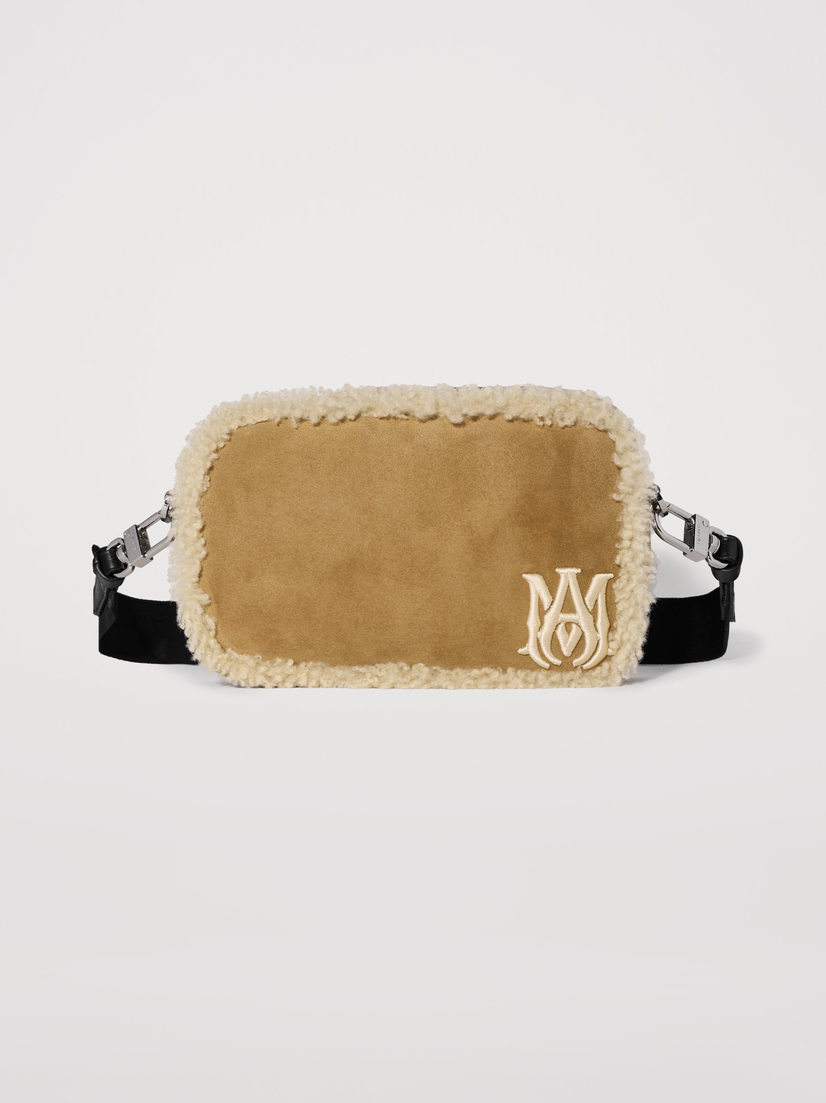 SHEARLING CAMERA CASE - NATURAL sold by AMIRI