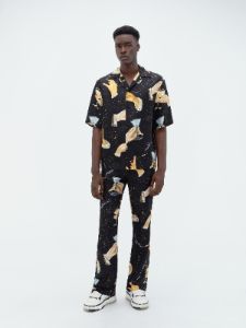 CHAMPAGNE SILK FLARE - Black sold by AMIRI