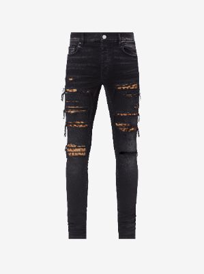 LEOPARD THRASHER JEAN - AGED BLACK sold by AMIRI
