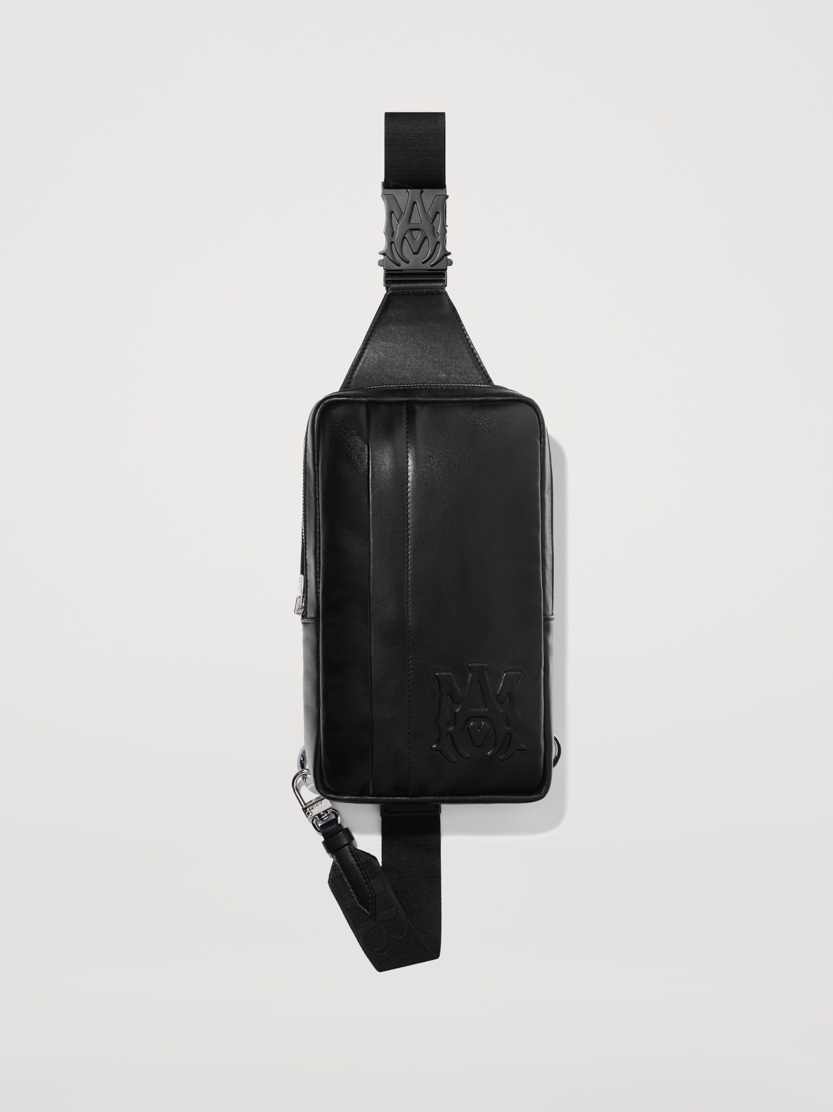 M.A. EMBOSSED SLING BAG - BLACK sold by AMIRI