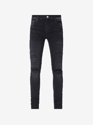 AMIRI LOGO APPLIQUÉ JEAN - AGED BLACK sold by AMIRI