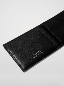 PEBBLED LOGO BIFOLD WALLET - BLACK sold by AMIRI
