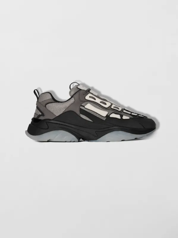 BONE RUNNER - BLACK / GREY made by AMIRI