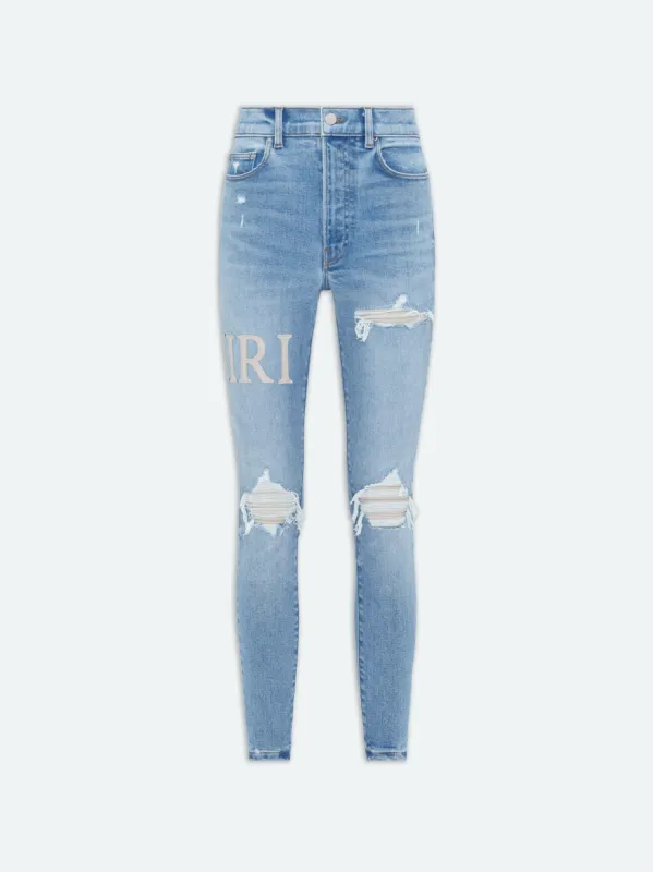 WOMEN - SERIF LOGO JEAN - Light Indigo sold by AMIRI