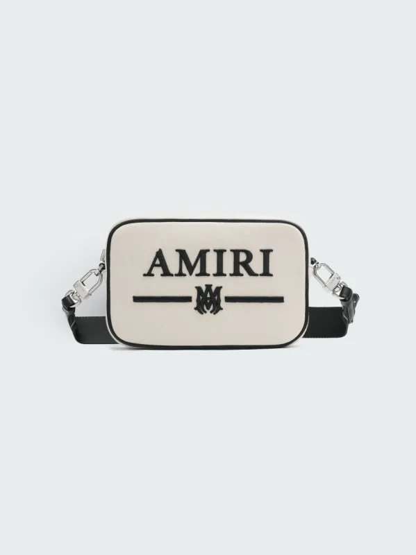 CANVAS EMBROIDERY CAMERA CASE - NATURAL BLACK sold by AMIRI