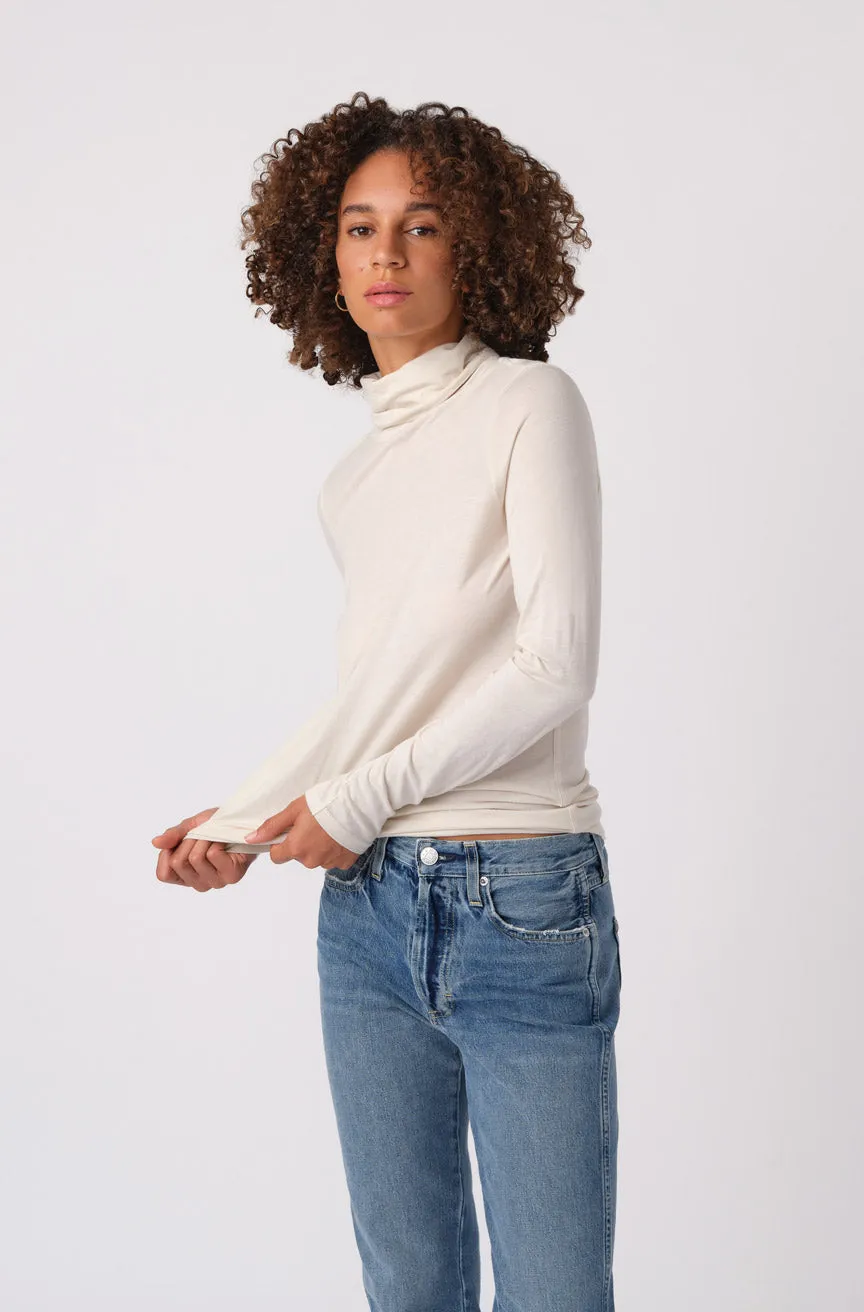 Pixie Turtleneck sold by AMO