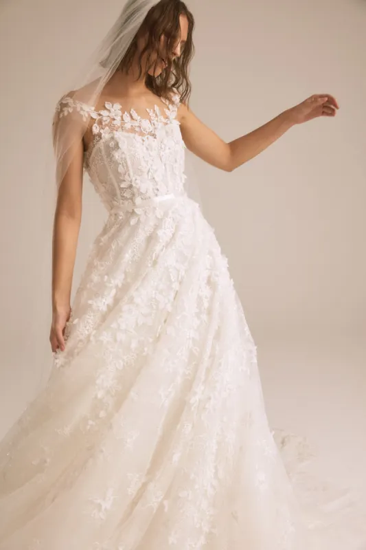 Tamia sold by Amsale